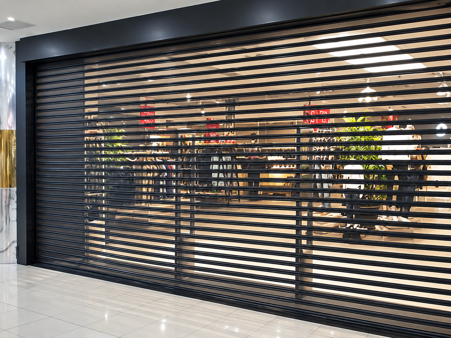 Perforated rolling shutter installed at commercial entrance — front elevation view
